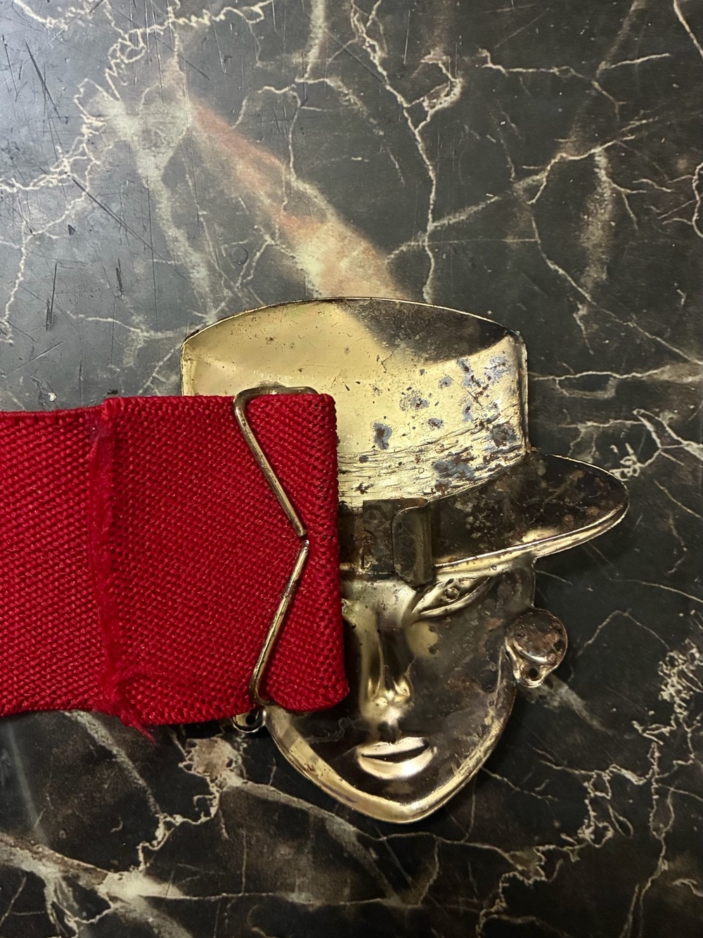 Gold Face Hat Buckle Belt with Red Strap